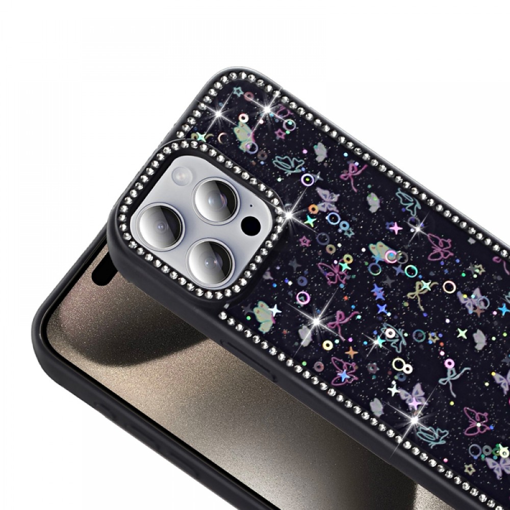 iPhone 15 Pro Zore Azra serisi taşlı çerçeveli simli fiyonk yıldız kelebek desenli parlak silikon kenarlı lüks koruyucu telefon kılıfı